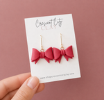 Load image into Gallery viewer, Bow Dangle Earrings in Red
