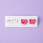 Load image into Gallery viewer, Bow Stud Earrings in Vintage Pink
