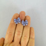 Load image into Gallery viewer, Bow Stud Earrings in Shimmery Lavender
