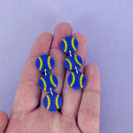 Load image into Gallery viewer, Purple &amp; Yellow Baseball Earrings
