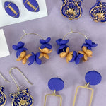 Load image into Gallery viewer, Petite Petal Hoop Earrings in Purple &amp; Gold
