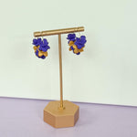 Load image into Gallery viewer, Petite Petal Hoop Earrings in Purple &amp; Gold

