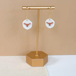 Load image into Gallery viewer, Longhorn Earrings in Burnt Orange &amp; Speckled Birch
