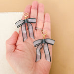 Load image into Gallery viewer, Bow Tie Dangle Earrings
