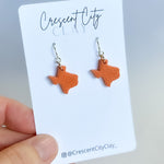 Load image into Gallery viewer, Texas Dangle Earrings in Burnt Orange
